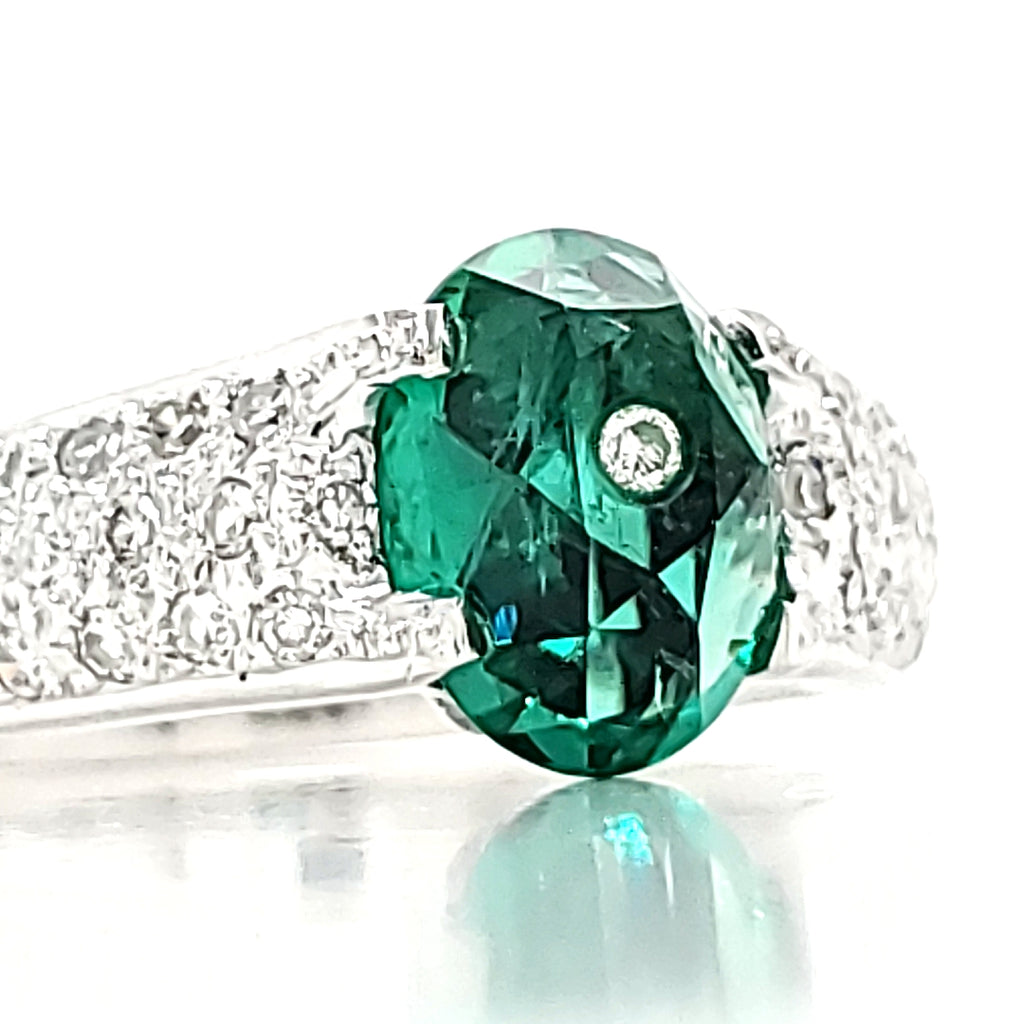 18k White Gold 1.45 Cts Oval Emerald and Diamond Engagement Ring