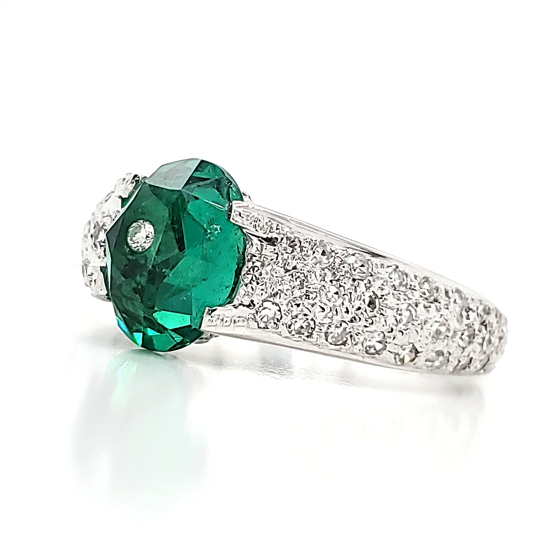18k White Gold 1.45 Cts Oval Emerald and Diamond Engagement Ring